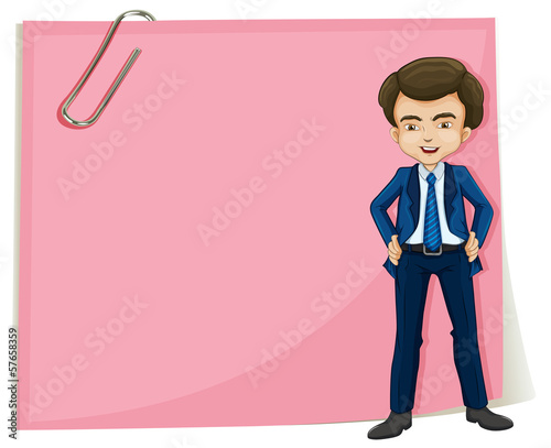 A handsome gentleman standing in front of the pink signage