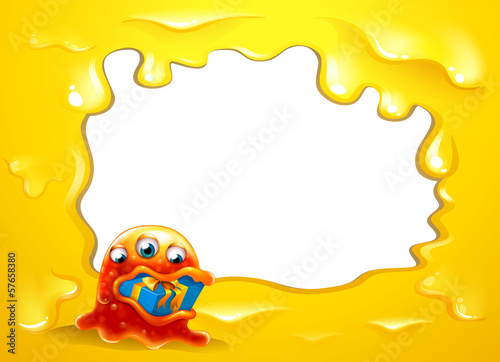 A yellow border template with a monster swallowing a gift