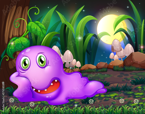 A violet monster resting under the tree in the middle of the nig