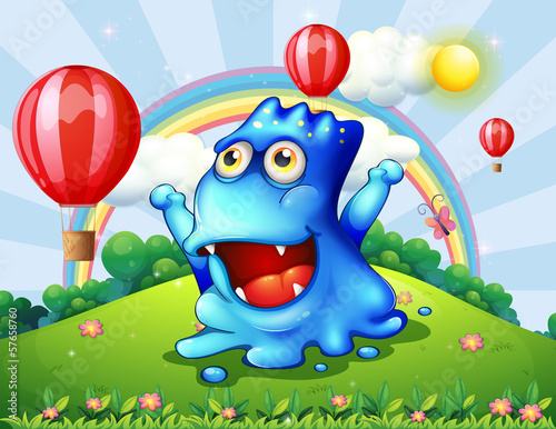 A happy blue monster at the hilltop with the floating balloons