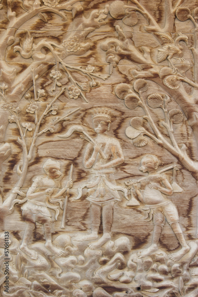 teak old wood engraving, in temple Thailand