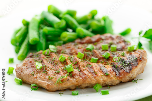 Beef steak with green beans