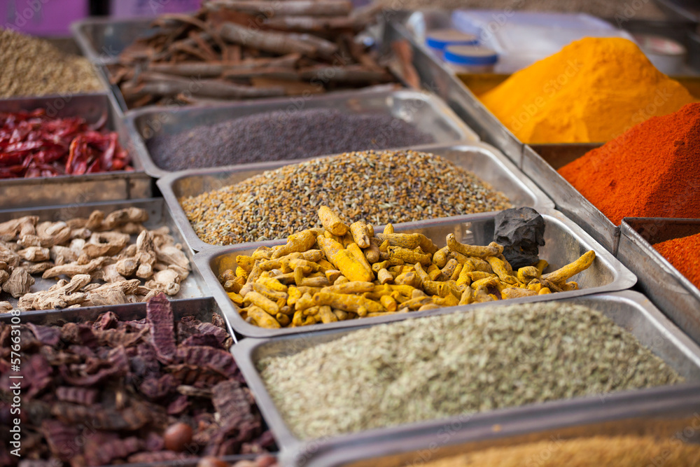Indian colored spices at local market in Goa, India