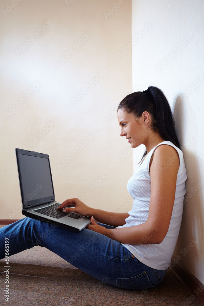 Portrait of young pretty woman with laptop Portrait of young pretty woman with laptop