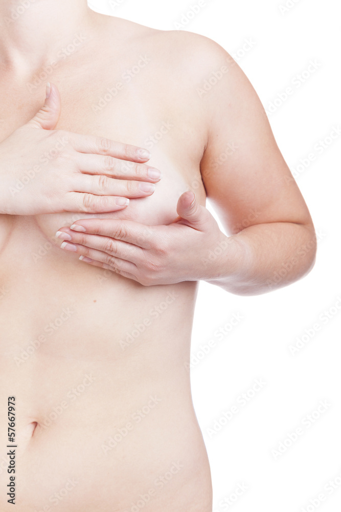 Woman examining breast, isolated on white Woman examining breast, isolated on white
