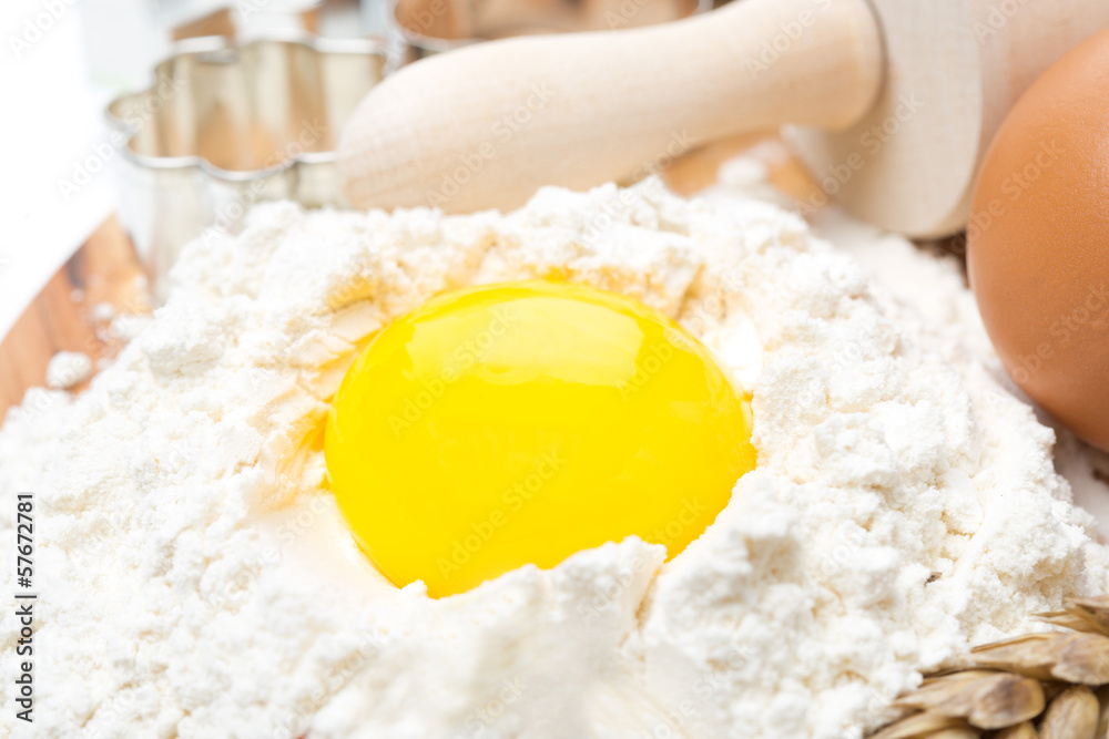 products for baking - flour and egg, selective focus, horizontal products for baking - flour and egg, selective focus, horizontal