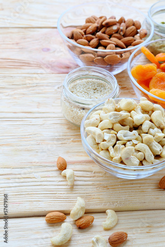 cashew nuts, almonds and dried apricots in a bowl