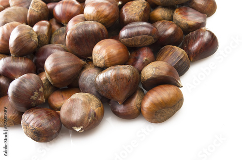 Delicious group of chestnuts close up background