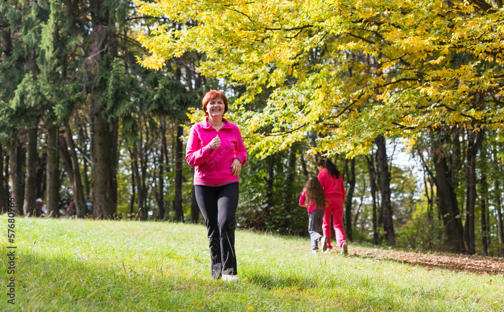 Fototapeta premium woman running in the forest