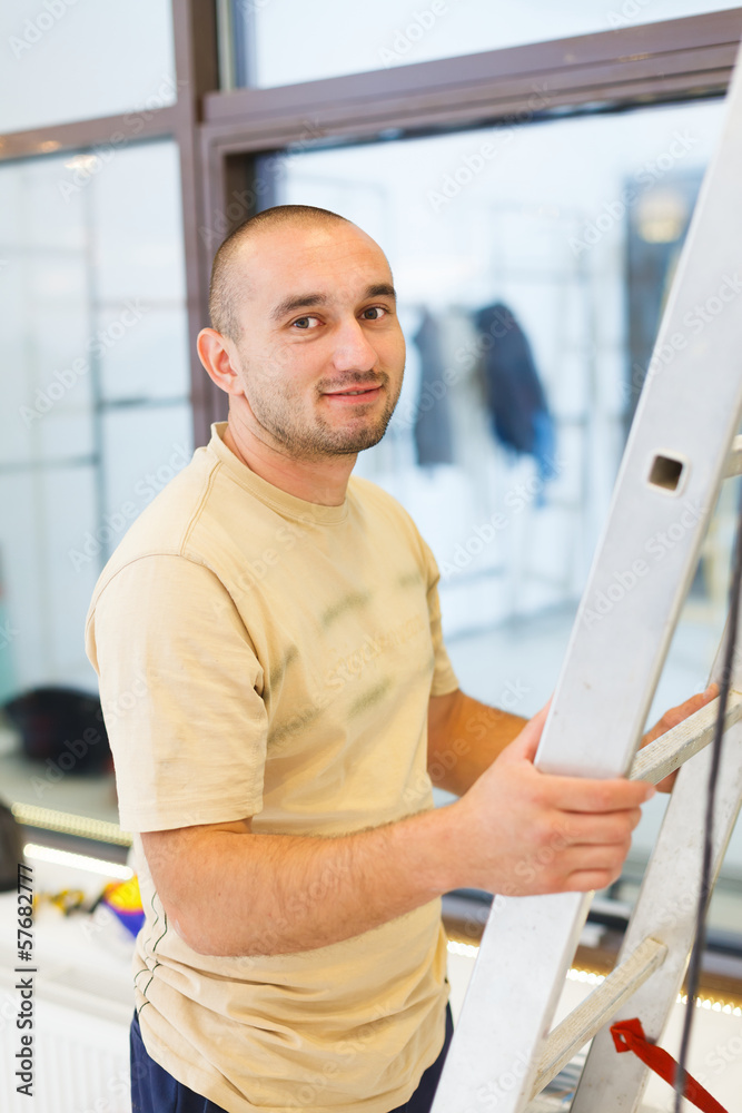 Fototapeta premium Smiling Electrician Man