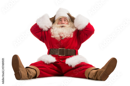 Hilarious and funny Santa Claus confused while sitting