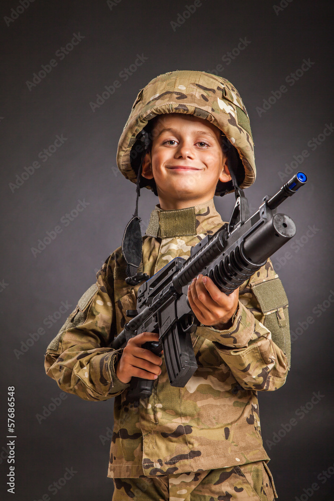 Young soldier with rifle Young soldier with rifle