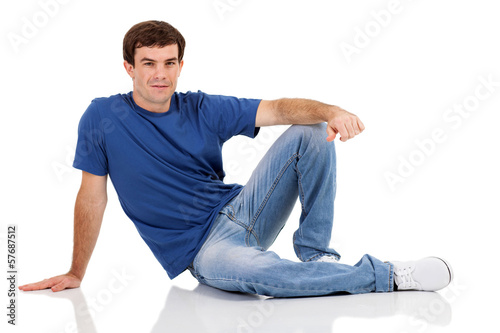 casual man sitting on the floor