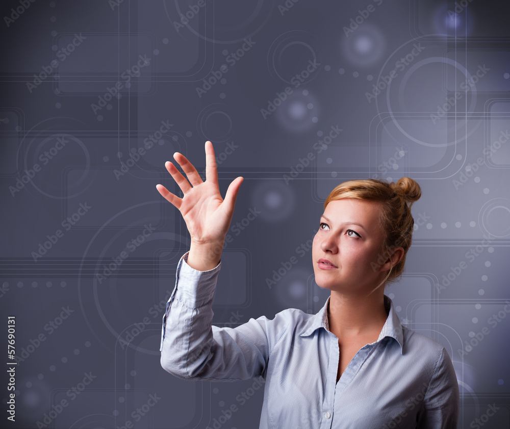 Young businesswoman touching copy space Young businesswoman touching copy space