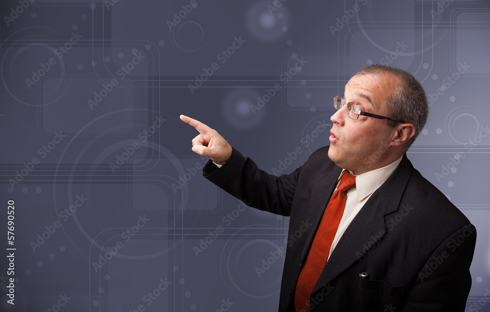 Elegant businessman touching copy space Elegant businessman touching copy space