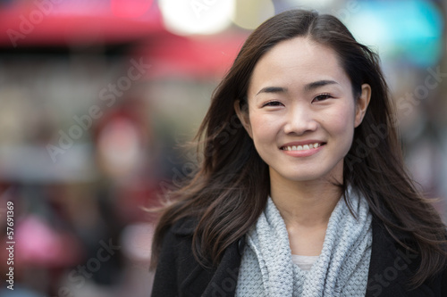 Obraz na plátně Asian woman in New York City smile happy face