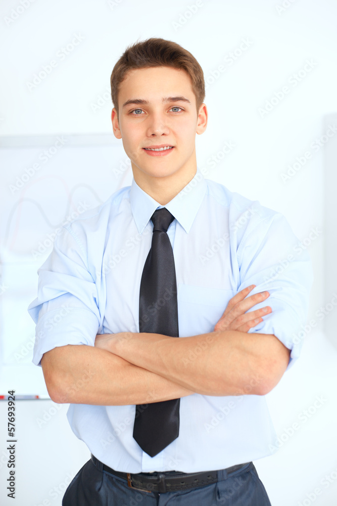 Portrait of young smiling businessman Portrait of young smiling businessman