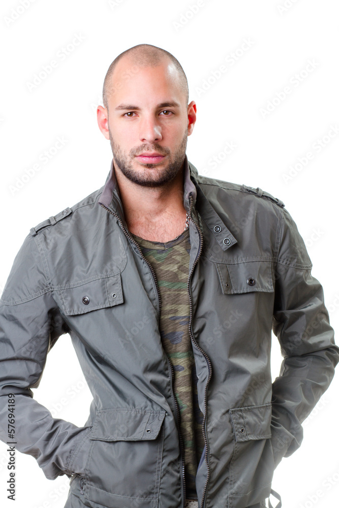 young man portrait, he wearing army t-shirt and grey jacket young man portrait, he wearing army t-shirt and grey jacket