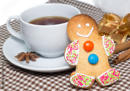 Gingerbread man with cup of tea