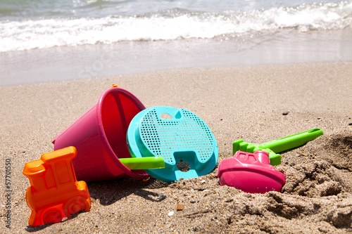 plastic toys on the beach