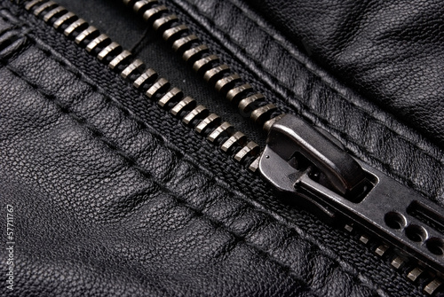Close-up zipper on black leather jacket