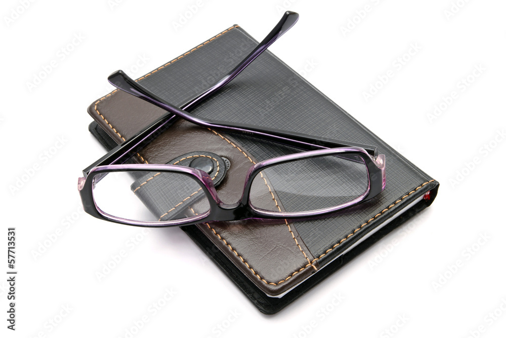 notebook and glasses notebook and glasses