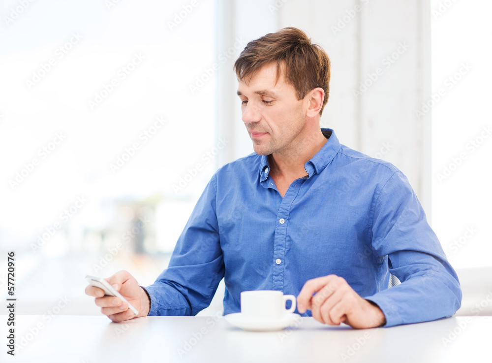 buisnessman with smartphone and cup of coffee buisnessman with smartphone and cup of coffee