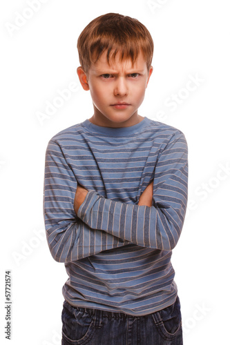 angry restless evil kid gloomy blond boy in striped sweater isol