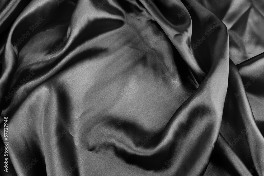 Fototapeta premium Black satin silk fabric texture