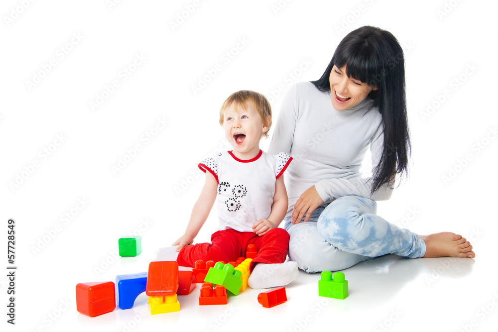 mother and baby playing with building blocks toy mother and baby playing with building blocks toy