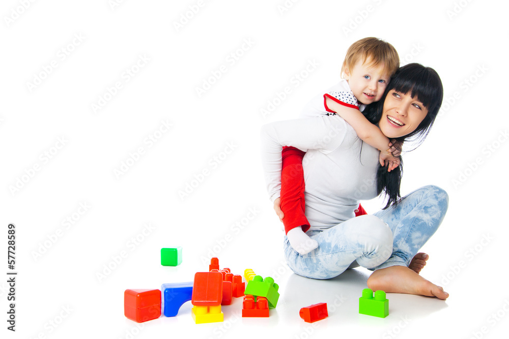 mother and baby playing with building blocks toy mother and baby playing with building blocks toy