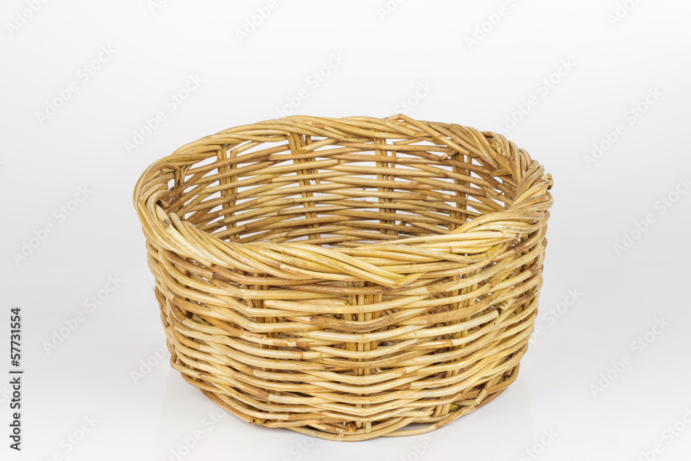 Brown wicker basket isolated on white background Brown wicker basket isolated on white background