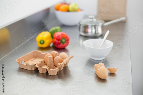 Vegetables and eggs lying on the work surface