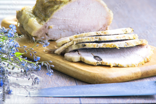 Cutting cold boiled pork to slices