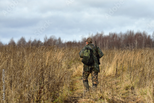 Hunter in field © Oleg Znamenskiy