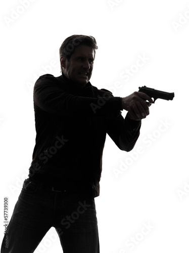 man killer policeman aiming gun portrait silhouette