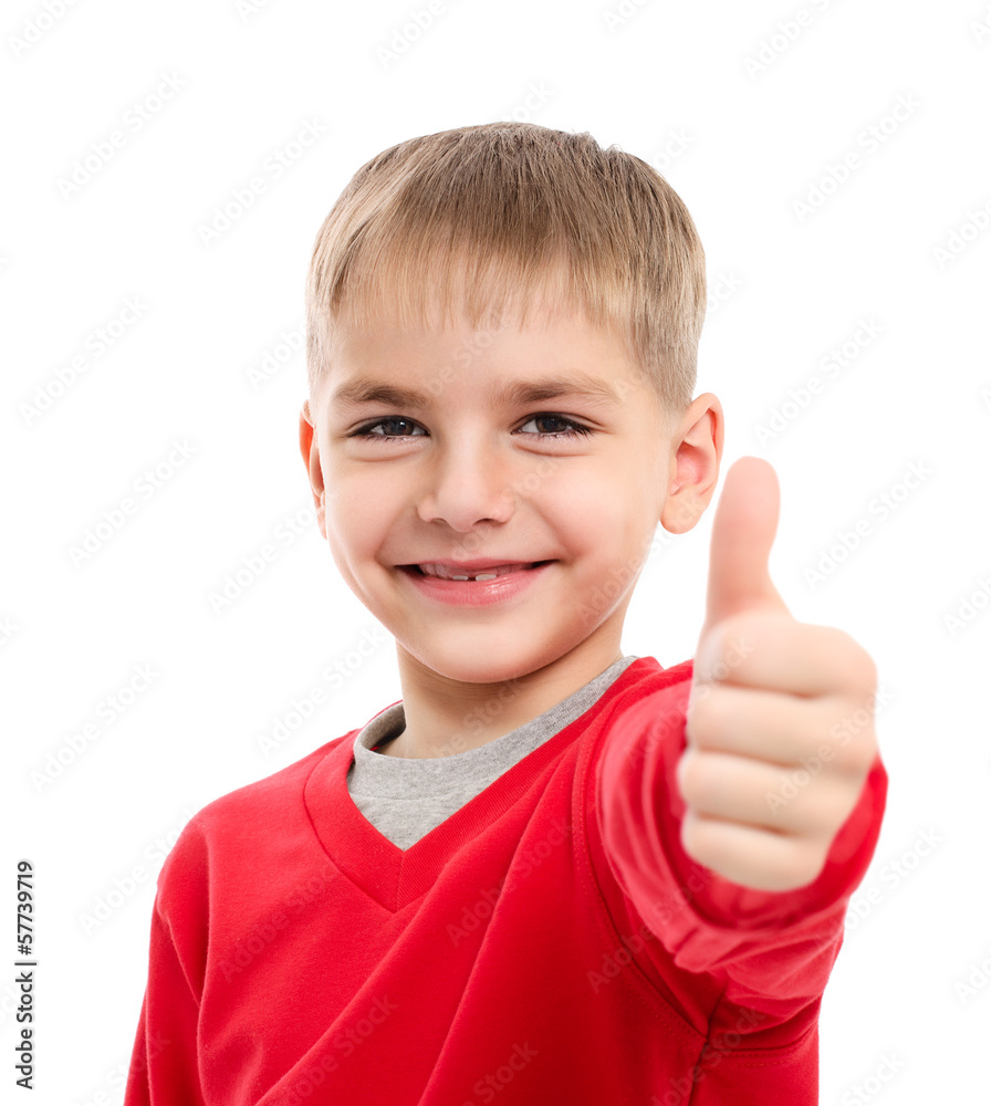 Portrait of happy boy showing thumbs up gesture Portrait of happy boy showing thumbs up gesture