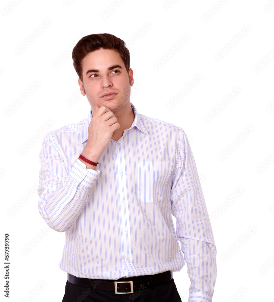 Pensive redhead man on white shirt standing Pensive redhead man on white shirt standing