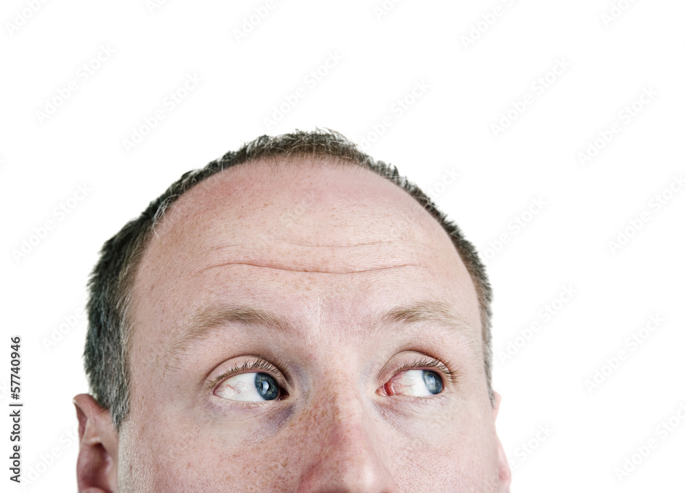 Fototapeta premium Young man looking up