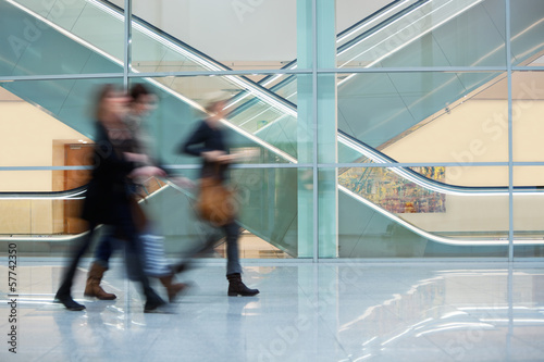 Trade Fair Visitors Walking Along Modern Corridor