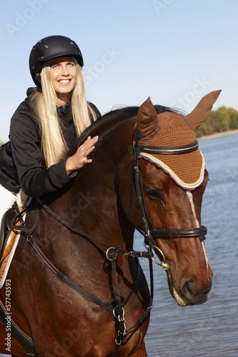 Closeup photo of rider and horse