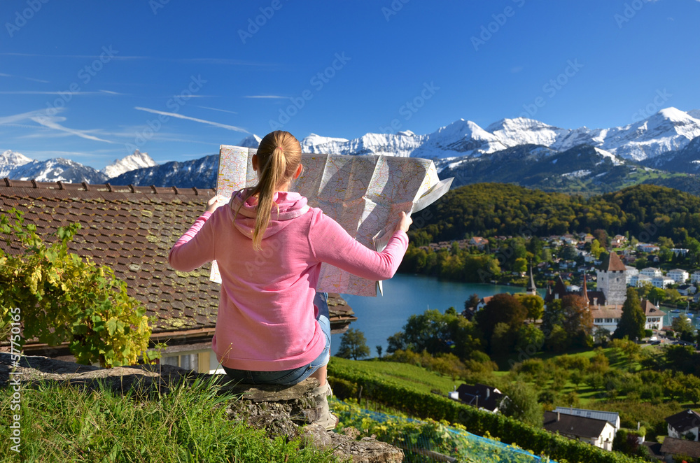 Girl looking to the map. Switzerland