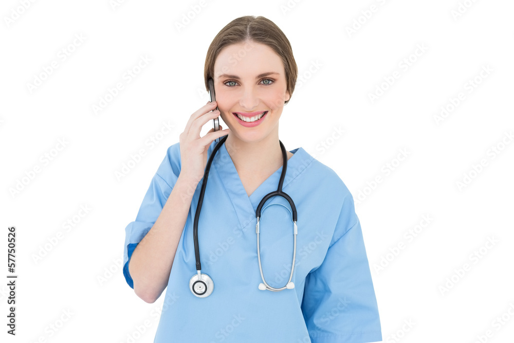Young woman doctor phoning with her smartphone Young woman doctor phoning with her smartphone