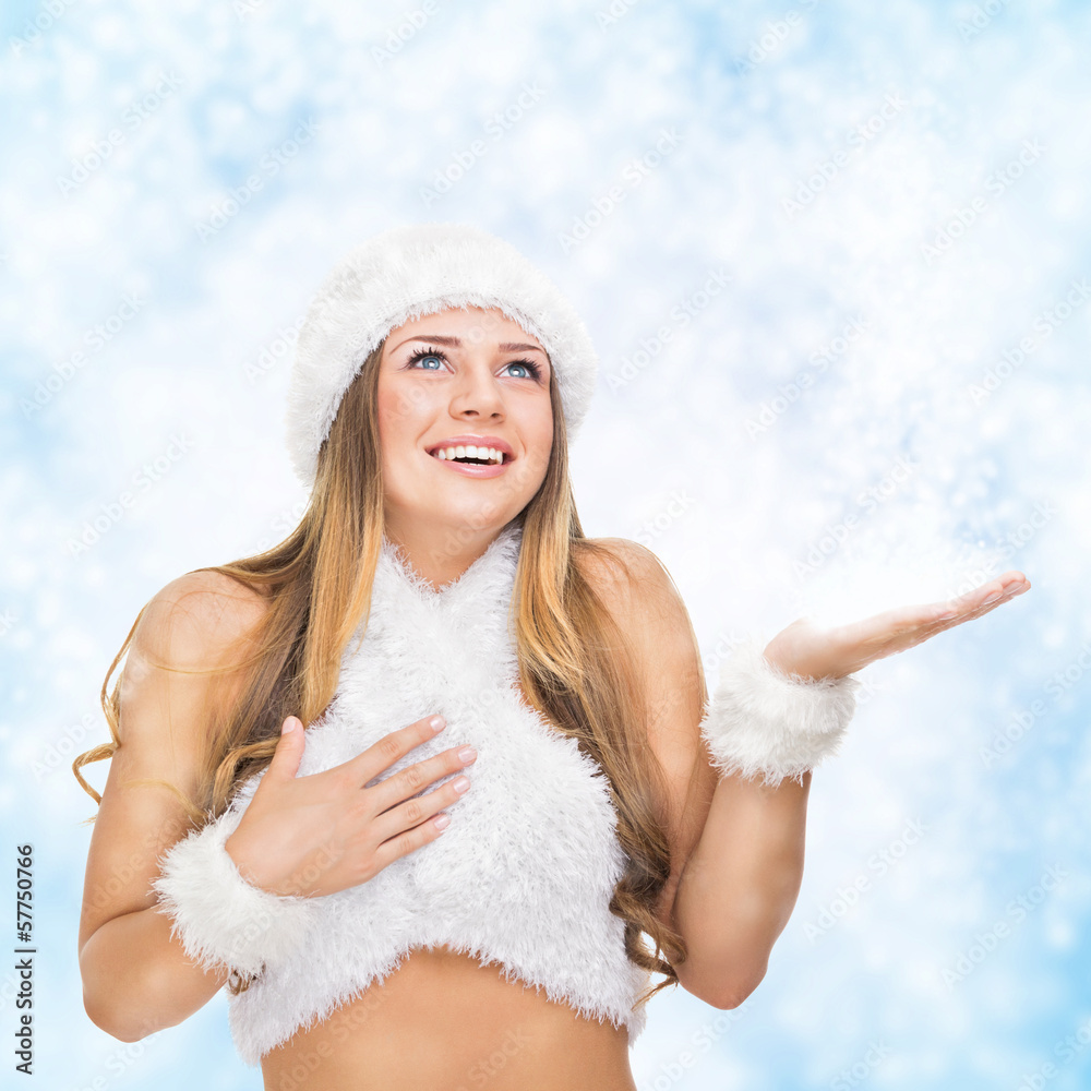 Beautiful young woman enjoying snow Beautiful young woman enjoying snow