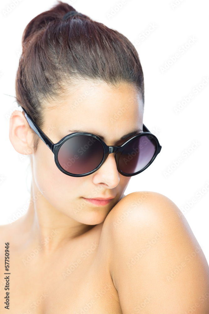 Pretty woman wearing gigantic round sunglasses Pretty woman wearing gigantic round sunglasses