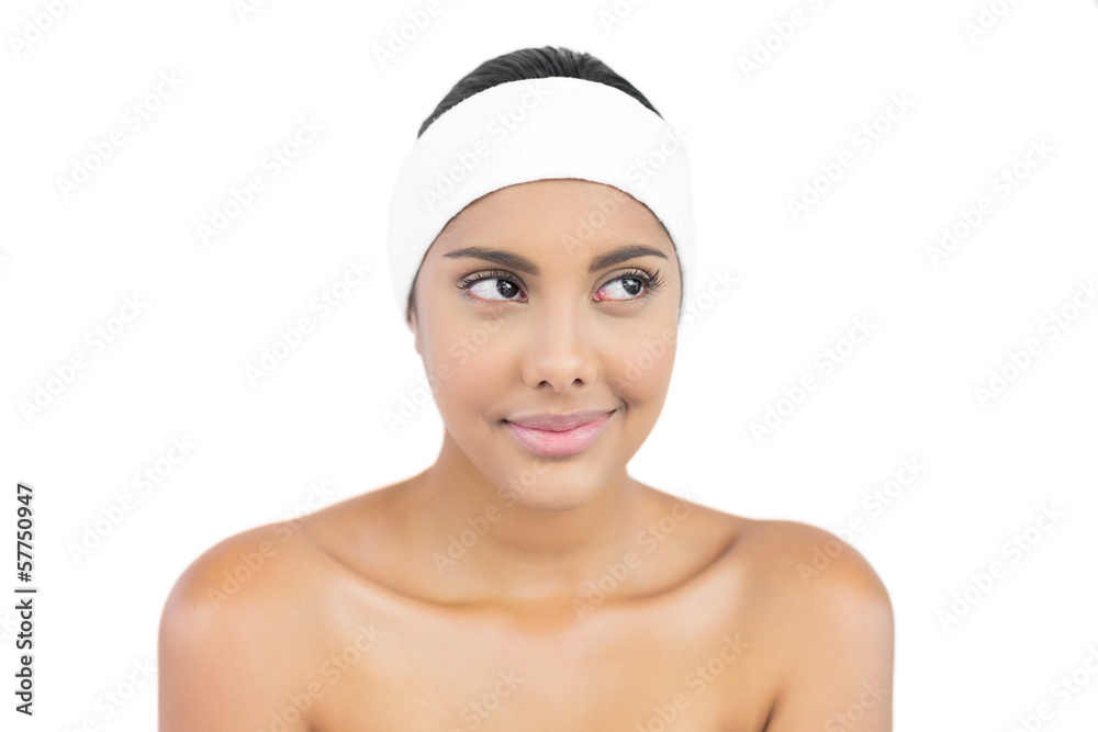 Pleased nude brunette with hairband looking away Pleased nude brunette with hairband looking away