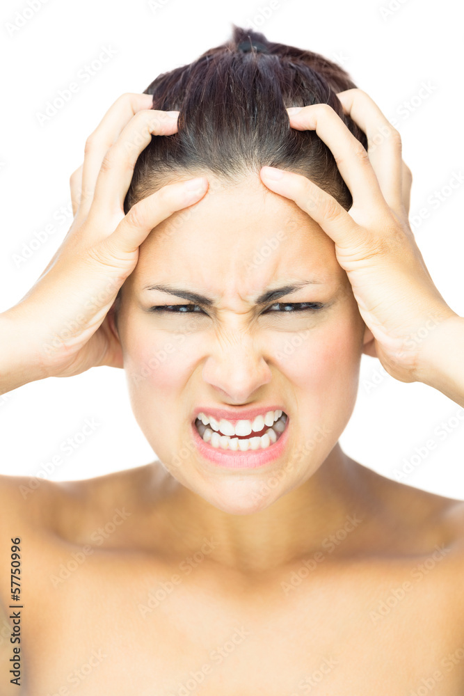 Front view of outraged brunette woman looking at camera Front view of outraged brunette woman looking at camera