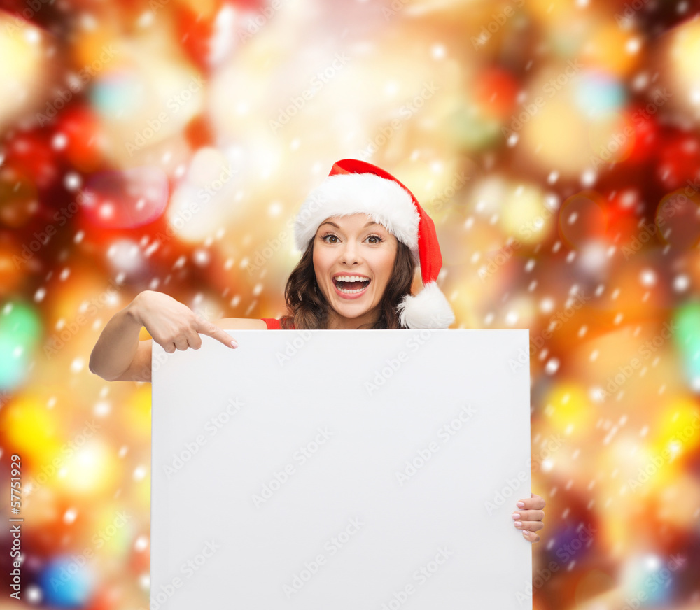 woman in santa helper hat with blank white board woman in santa helper hat with blank white board