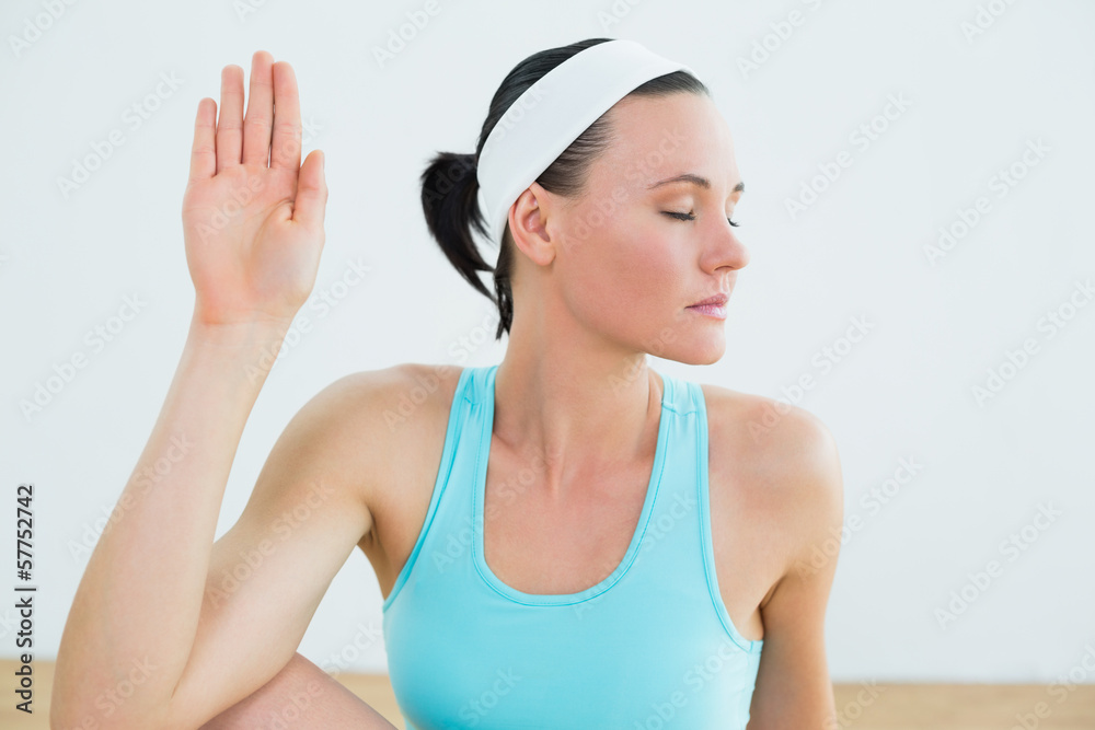 Fit woman with eyes closed at fitness studio Fit woman with eyes closed at fitness studio