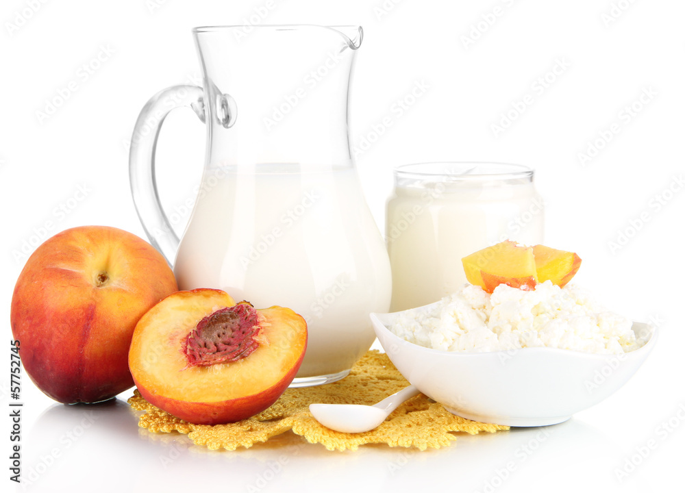Fresh dairy products with peaches isolated on white Fresh dairy products with peaches isolated on white